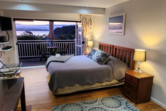 Room #2 bed and balcony